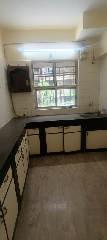 Kitchen in 2 BHK Apartment at Anita Nagar Chs, Kandivali East – for Rent