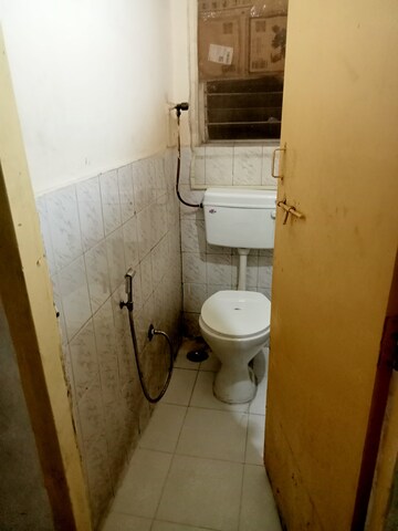 Bathroom in 1 BHK Apartment at Nanak CHS, Kopar Khairane – for Rent