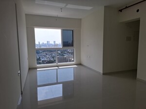 Room in 2 BHK Apartment at Wadhwa TW Gardens, Kandivali East – for Sale