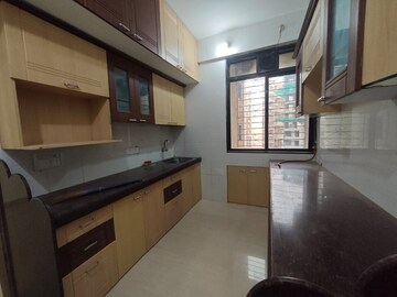 Kitchen in 3 BHK Apartment at Safal Shree Saraswati Phase 4, Chembur – for Rent