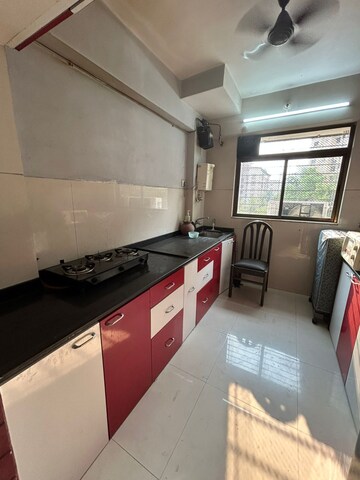 Kitchen in 2 BHK Apartment at Vijay Vilas Taurus Building 11 To 15, Ghodbunder Road – for Rent