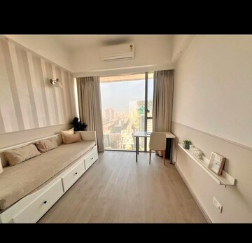 Bedroom in 2 BHK Apartment at Transcon Triumph Tower, Andheri West – for Rent