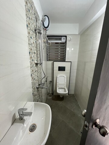 Bathroom in 1.5 BHK Apartment at Sugee Atharva, Prabhadevi – for Rent