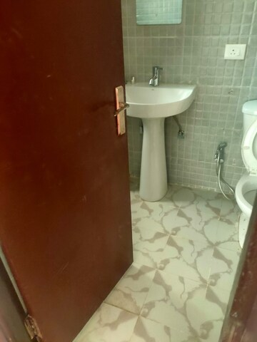 Bathroom in 3 BHK Apartment at Amrapali Tropical Garden, Tech Zone 4 Greater Noida – for Rent