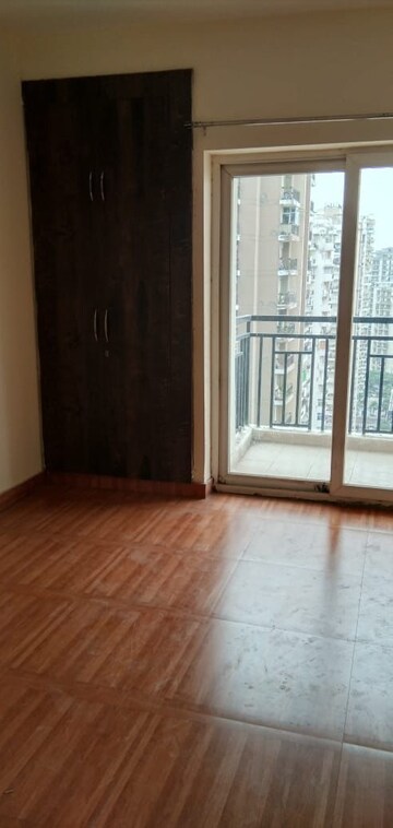 Room in 2 BHK Apartment at Galaxy North Avenue ll, Gaur City 2 – for Rent