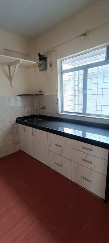 Kitchen in 2 BHK Apartment at Anita Vihar, Kandivali East – for Rent