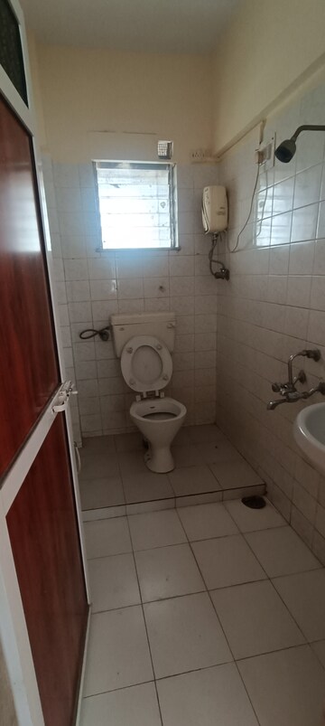 Bathroom in 2 BHK Apartment at Anita Vihar, Kandivali East – for Rent