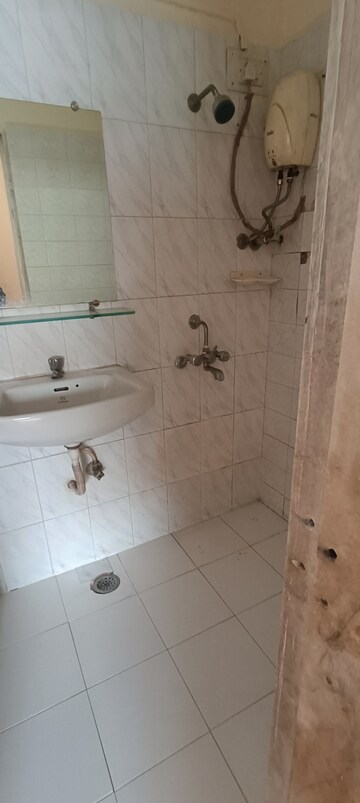 Bathroom in 2 BHK Apartment at Anita Vihar, Kandivali East – for Rent