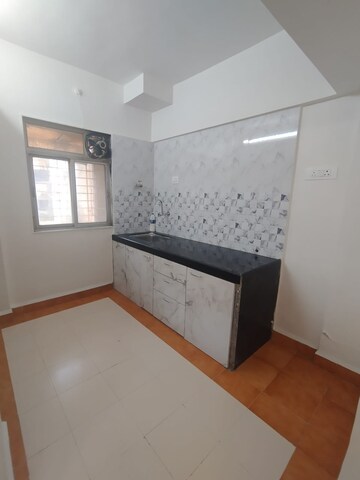 Kitchen in 2 BHK Apartment at Puranik Pratah Pushp, Ghodbunder Road – for Rent