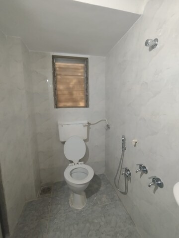 Bathroom in 2 BHK Apartment at Puranik Pratah Pushp, Ghodbunder Road – for Rent