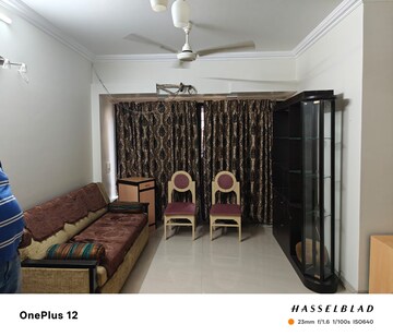 Living Room in 2 BHK Apartment at Dhiraj Building, Andheri East – for Rent