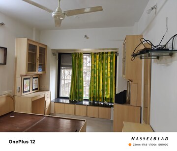 Living Room in 2 BHK Apartment at Dhiraj Building, Andheri East – for Rent