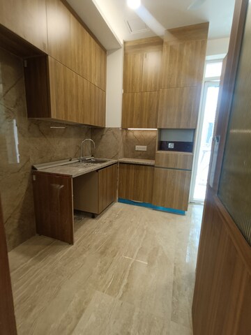 Kitchen in 2 BHK Apartment at Ambience Creacions, Sector 22 – for Rent