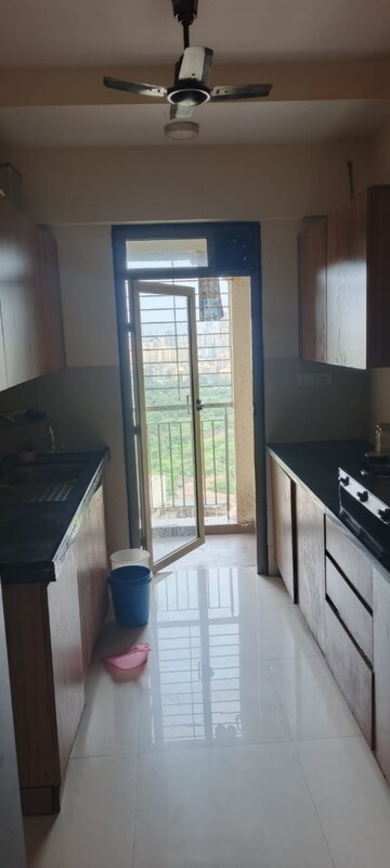 Kitchen in 2.5 BHK Apartment at Piramal Vaikunth, Balkum Pada – for Rent