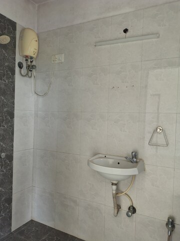 Bathroom in 2 BHK Apartment at Shree Sai Surya Kiran, Andheri West – for Rent