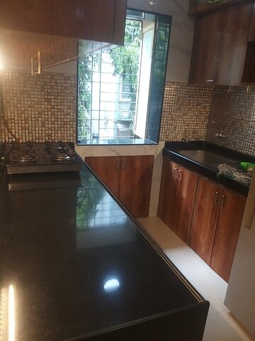 Kitchen in 3 BHK Apartment at Garden Colony, Mahim – for Rent