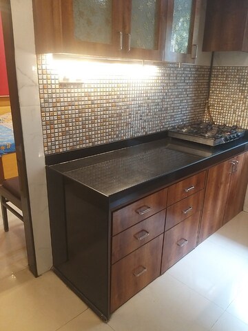 Kitchen in 3 BHK Apartment at Garden Colony, Mahim – for Rent