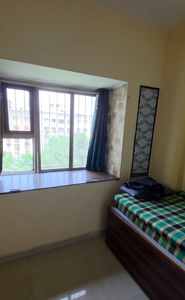 Bedroom in 2 BHK Apartment at Neelkanth Greens, Manpada – for Rent