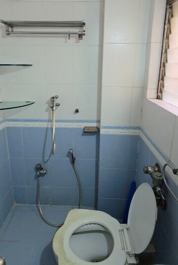 Bathroom in 2 BHK Apartment at Neelkanth Greens, Manpada – for Rent