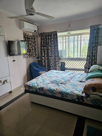 Bedroom in 2 BHK Apartment at Sheth Vasant Lawns, Laxmi Nagar – for Rent
