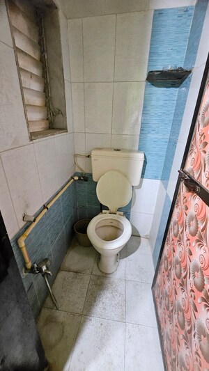 Bathroom in 1 BHK Apartment at Hari Om Pooja, Dombivli West – for Sale