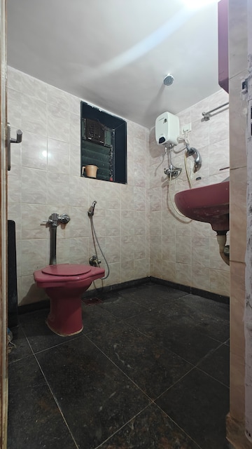 Bathroom in 2 BHK Apartment at Falcon Crest Apartments, Yogi Nagar – for Rent