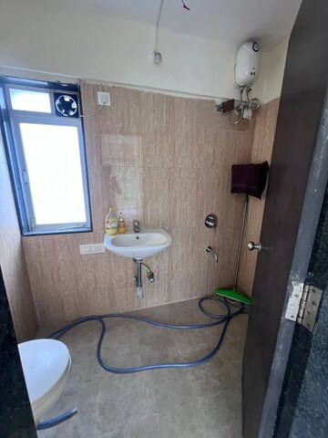 Bathroom in 3 BHK Apartment at Conwood Enclave, Vasant Vihar – for Rent