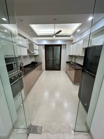 Kitchen in 3 BHK Apartment at Boutique Residential Apartments C-253, Defence Colony – for Rent