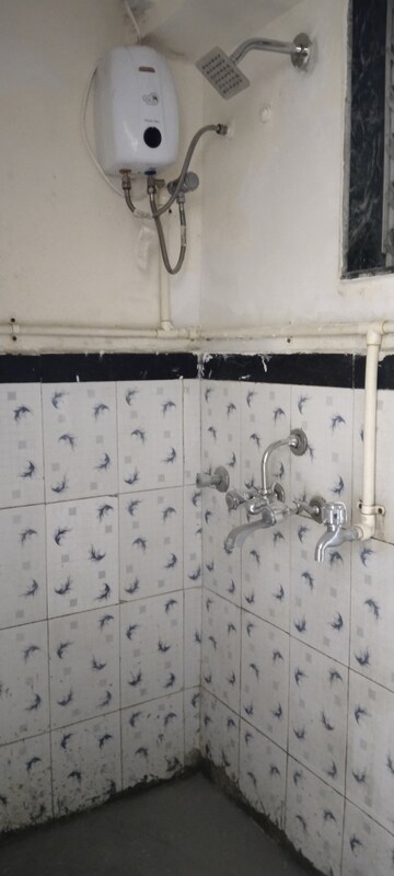 Bathroom in 1 BHK Apartment at MHADA Century Mill, Lower Parel – for Rent