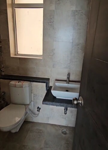 Bathroom in 3 BHK Apartment at Mahagun Mirabella, Sector 79 – for Sale