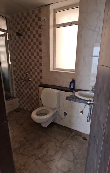 Bathroom in 3 BHK Apartment at Mahagun Mirabella, Sector 79 – for Sale