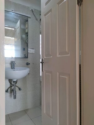 Bathroom in 4 BHK Apartment at Jaypee Greens Kalypso Court, Sector 128 – for Sale