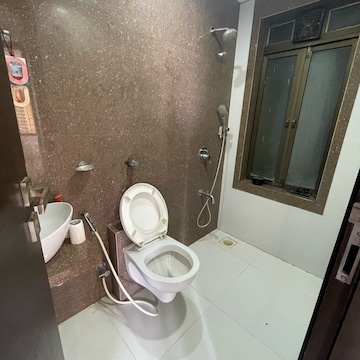 Bathroom in 1 BHK Apartment at Lalani Grandeur, Riddhi Gardens – for Rent