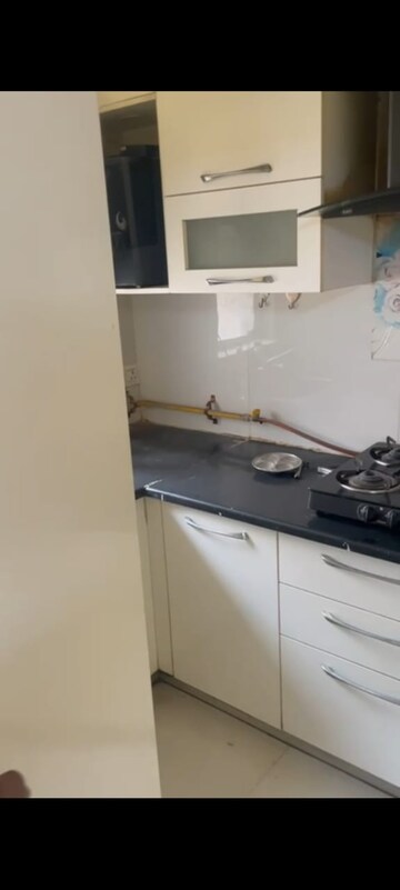 Kitchen in 2 BHK Apartment at Paras Seasons, Sector 168 – for Rent