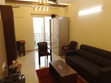 Living Room in 2 BHK Apartment at Signature Global Orchard Avenue, Sector 93 – for Rent