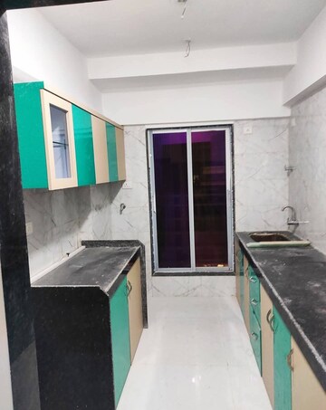 Kitchen in 2 BHK Apartment at JPV Pratap Liberty One, Malad West – for Rent