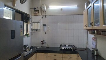 Kitchen in 2 BHK Apartment at Kumar Mahatma Society, Kothrud – for Rent