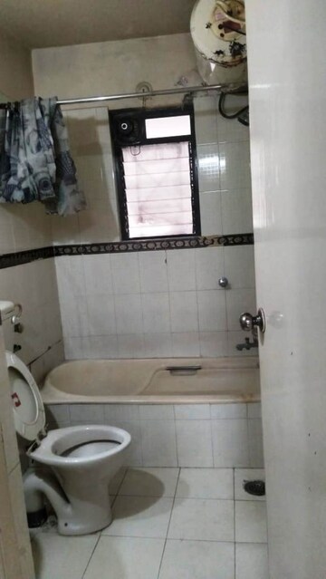 Bathroom in 2 BHK Apartment at Kumar Mahatma Society, Kothrud – for Rent