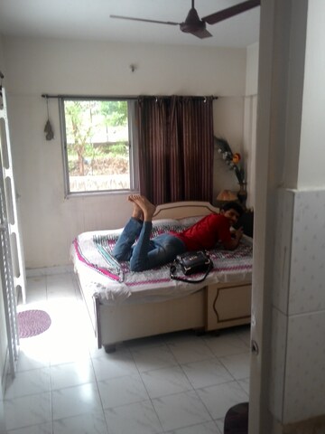 Bedroom in 2 BHK Apartment at Saurabh CHS Karve Nagar, Karve Nagar – for Rent