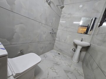 Bathroom in 3 BHK Apartment at Dhakoli – for Sale