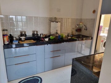 Kitchen in 2 BHK Apartment at Shapoorji Pallonji Joyville Celestia, Hadapsar – for Rent