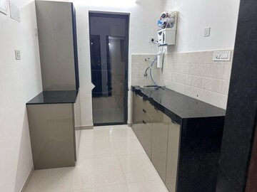 Kitchen in 1 BHK Apartment at Shapoorji Pallonji Joyville Celestia, Hadapsar – for Rent
