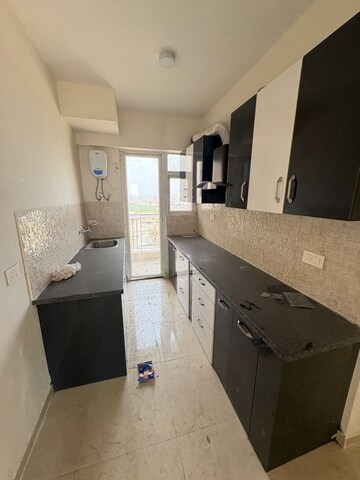 Kitchen in 2.5 BHK Apartment at Signature The Millennia 2, Sector 37d – for Rent