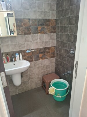 Bathroom in 1 BHK Apartment at Ashray Jaswanti Woods, Mulund West – for Sale