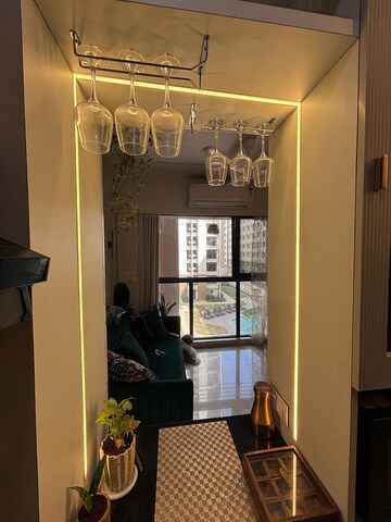 Living Room in 1 BHK Apartment at Lodha Crown Quality Homes, Majiwada – for Rent