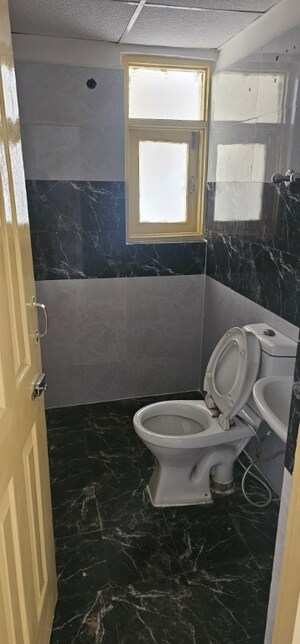 Bathroom in 2.5 BHK Apartment at SVP Gulmohur Garden, Raj Nagar Extension – for Sale