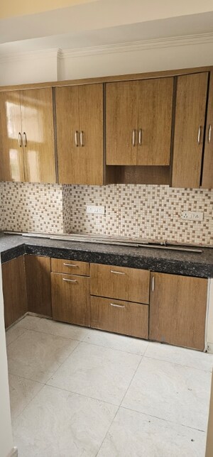 Kitchen in 2.5 BHK Apartment at SVP Gulmohur Garden, Raj Nagar Extension – for Sale