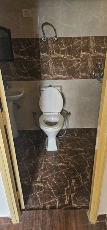 Bathroom in 2.5 BHK Apartment at SVP Gulmohur Garden, Raj Nagar Extension – for Sale