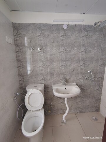 Bathroom in 3 BHK Apartment at Amrapali Enchante, Tech Zone 4 Greater Noida – for Rent