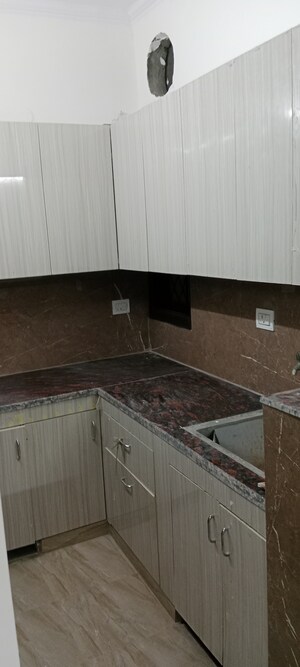 Kitchen in 1.5 BHK Builder Floor at Amritpuri – for Sale